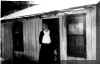 Erna in front of her cabin in Eastern Kentucky in the early 1940s - click for larger view