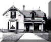 William Gittins in front of his house in Atlantic, IA. Click for larger view.